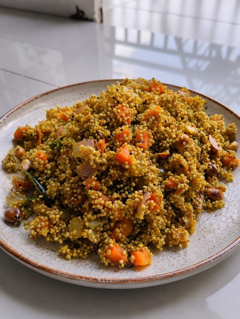 Quinoa veg poha with carrot, peanuts and curry leaves